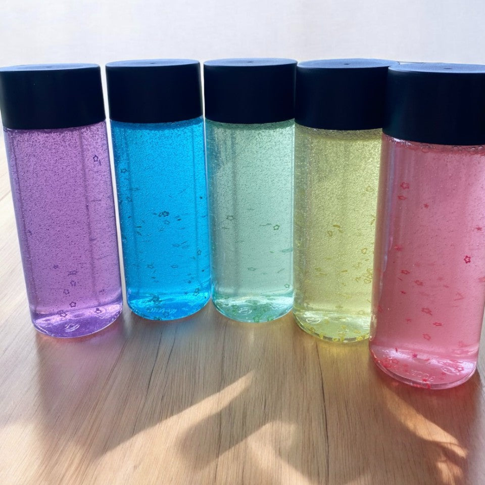 Rainbow Sensory Calming Bottles. Exploration and Stress Relief