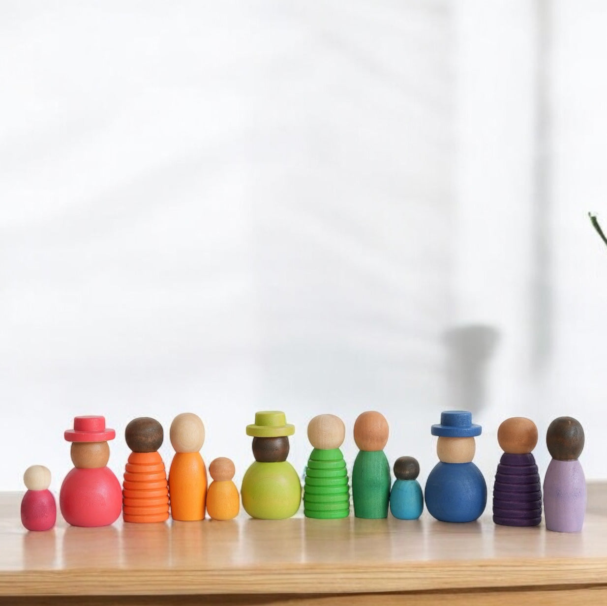 Montessori inspired Wooden colour sorting rings and mini figurines.  Early learning toy