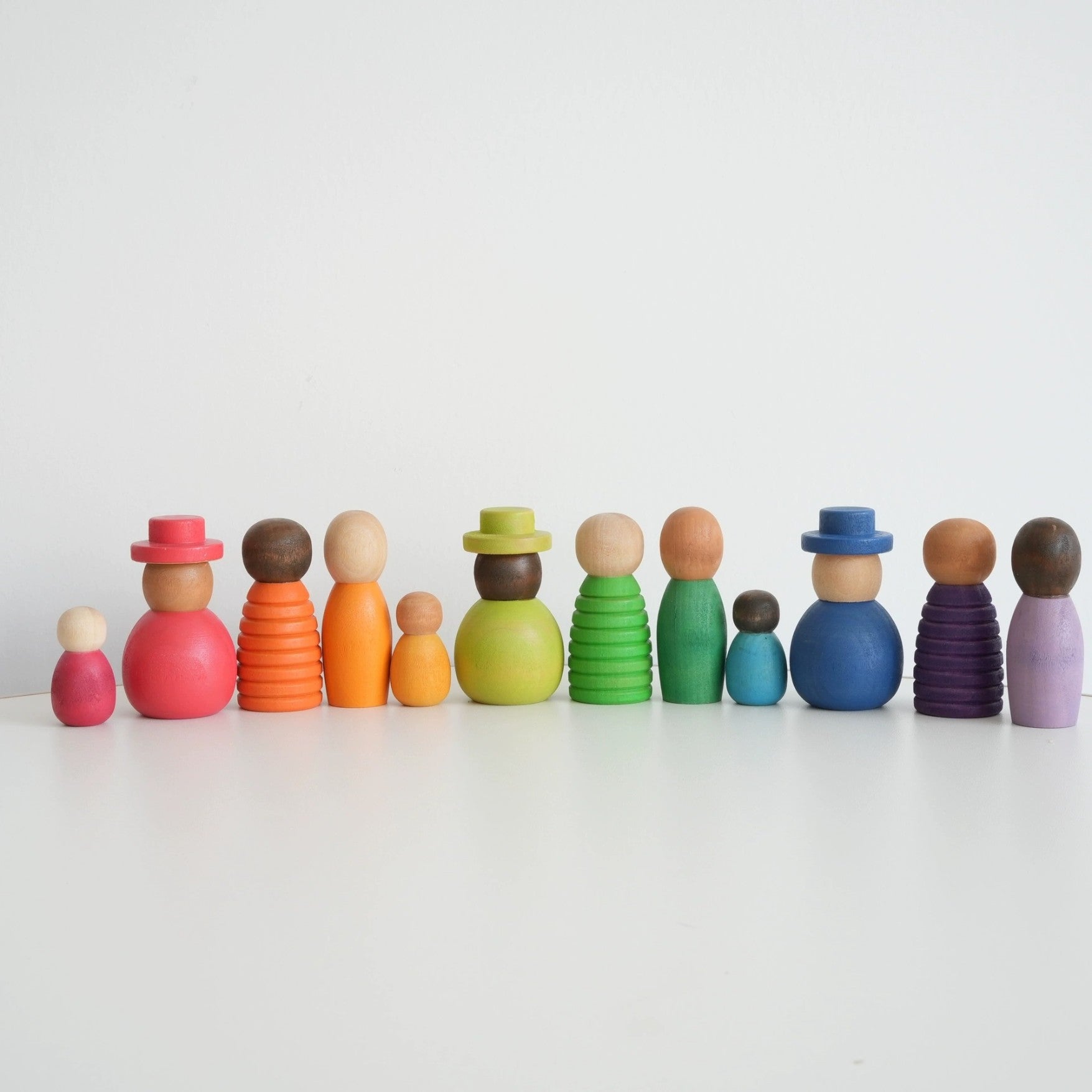 Montessori inspired Wooden colour mini figurines. People of the world.  Early learning toy